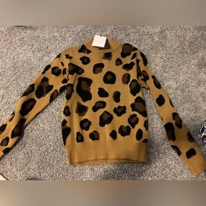 New with tags cheetah sweater.
